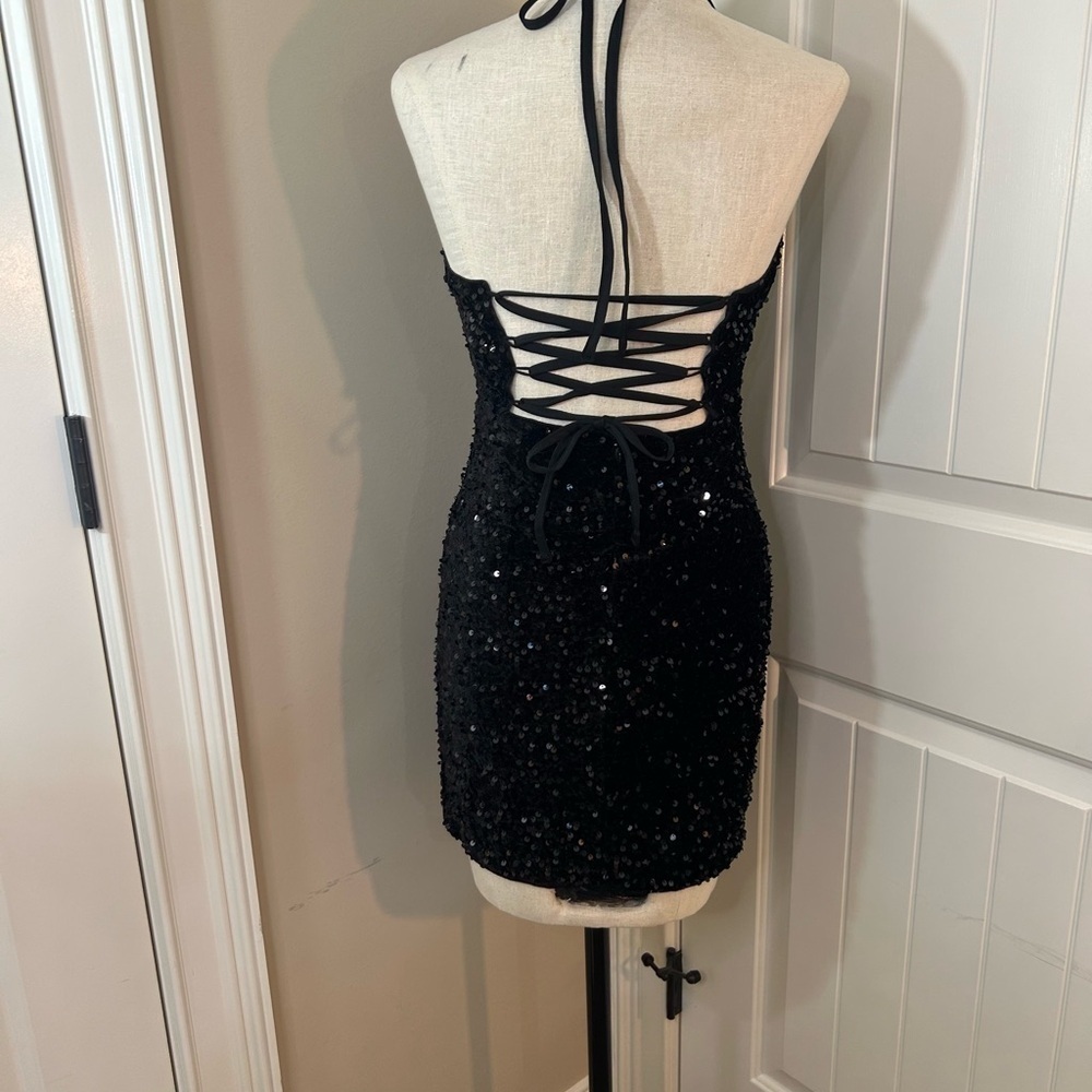 Black Sequin Ruched Sheath Dress with Plunge Neckline. Semi formal. Night Life. - Picture 3 of 12